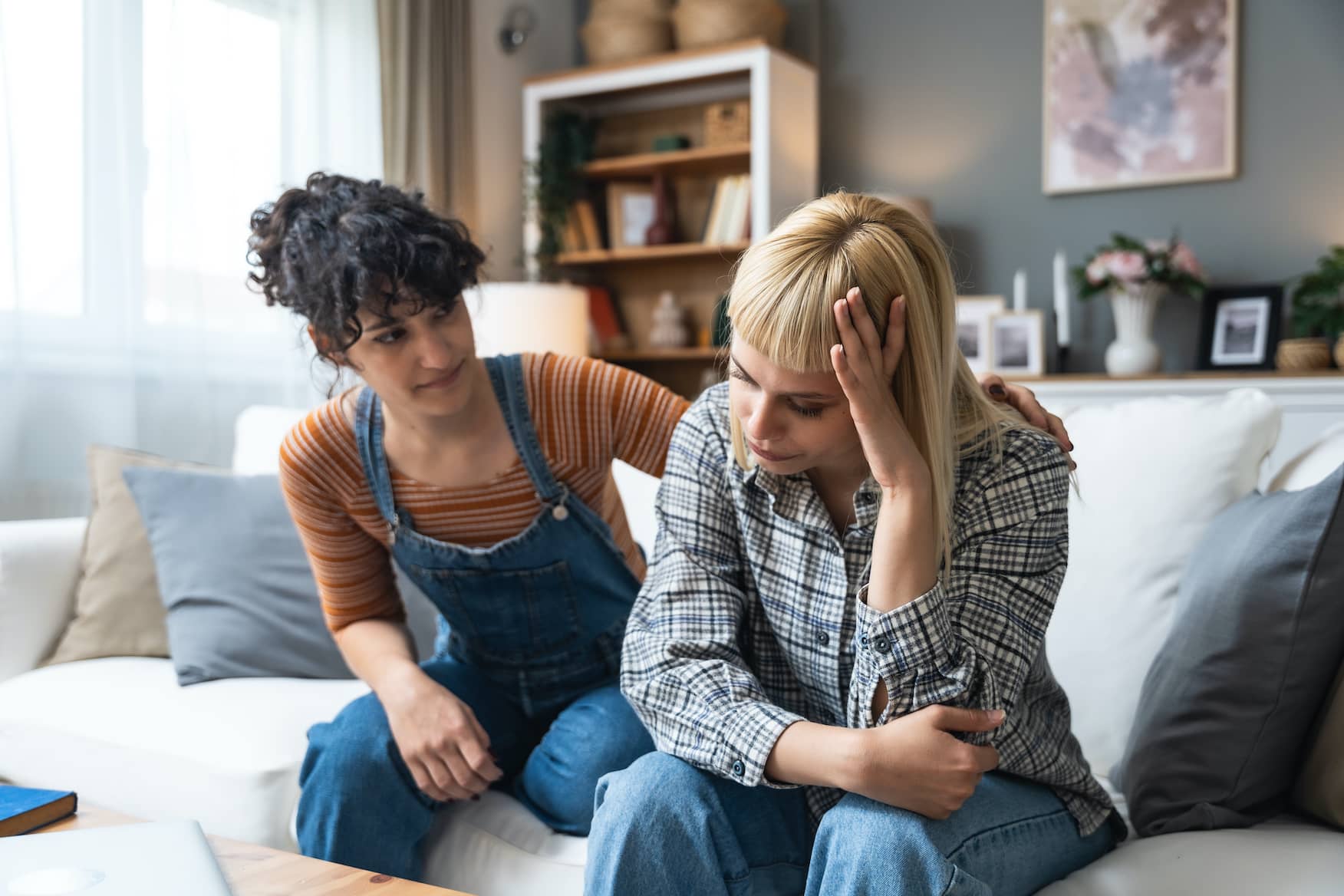 Young couple having relationship difficulties and arguing at home