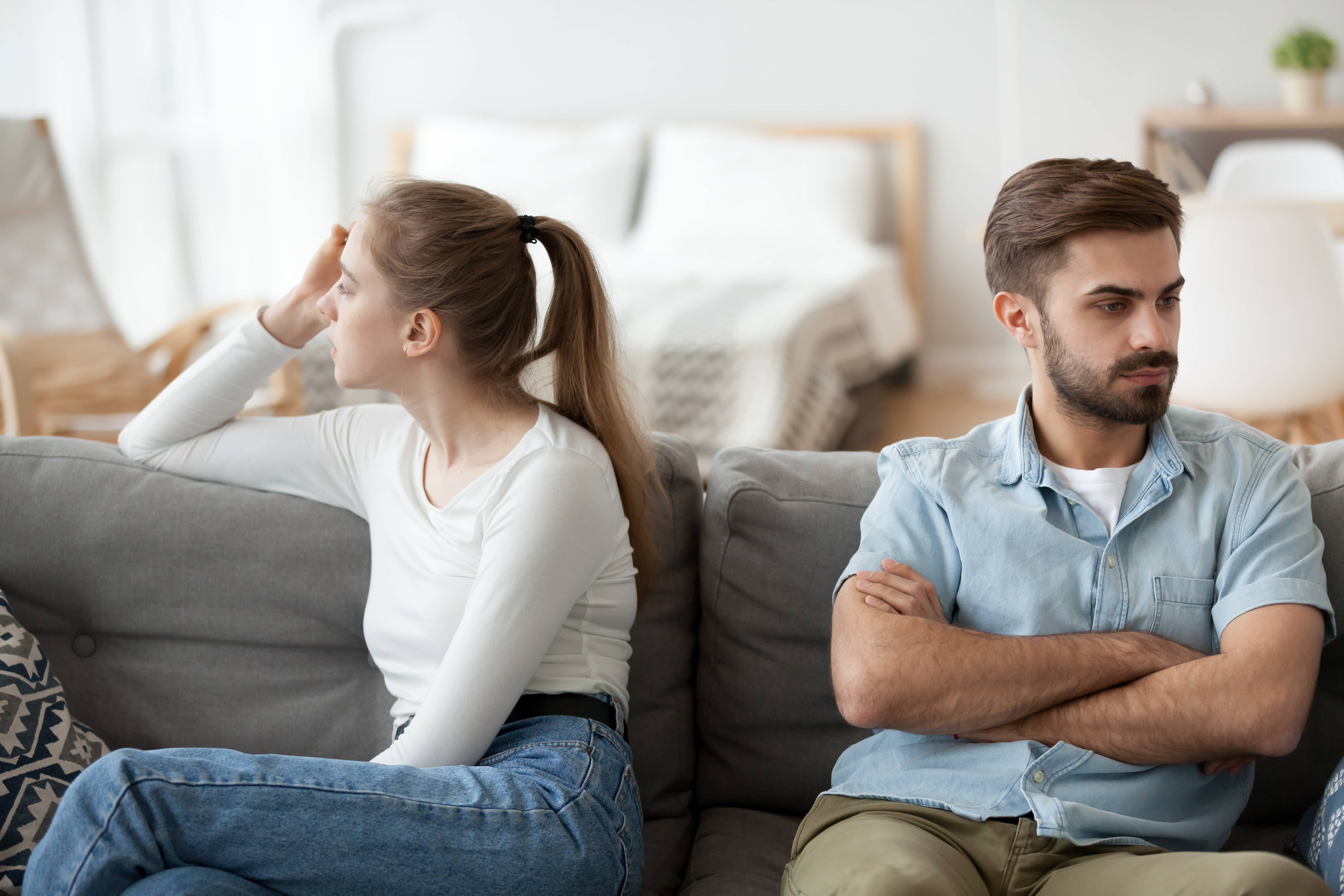 Couple in disagreement and pouting