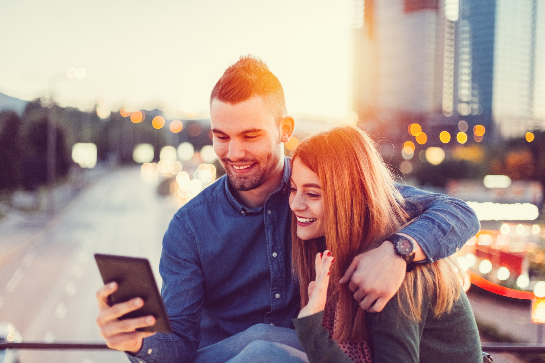 Young happy couple taking a selfie