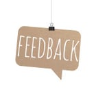 Feedback sign - Giving and receiving feedback is crucial for employees and leaders to grow and develop.