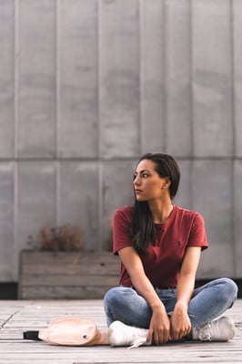 A young woman pausing to determine what she wants