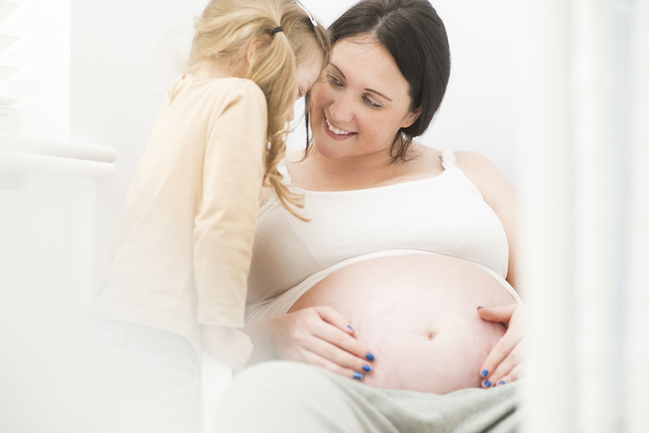 Mother and daughter in maternity photos