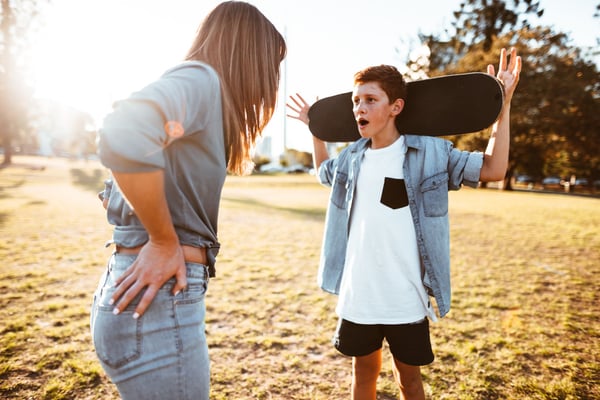 Teenage boy argues with his mom