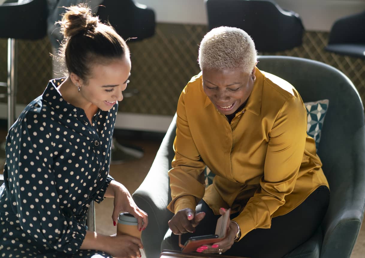 Two colleagues reciprocating and sharing information.