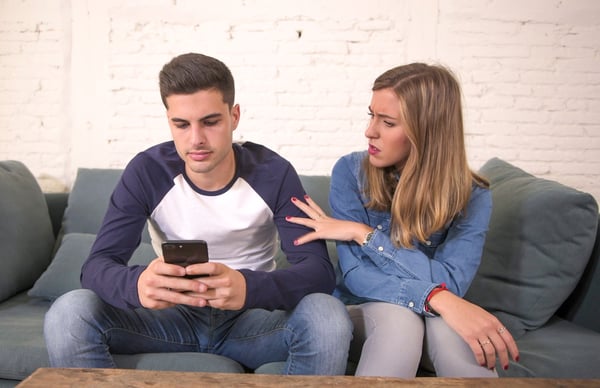 A young woman complaining to her husband