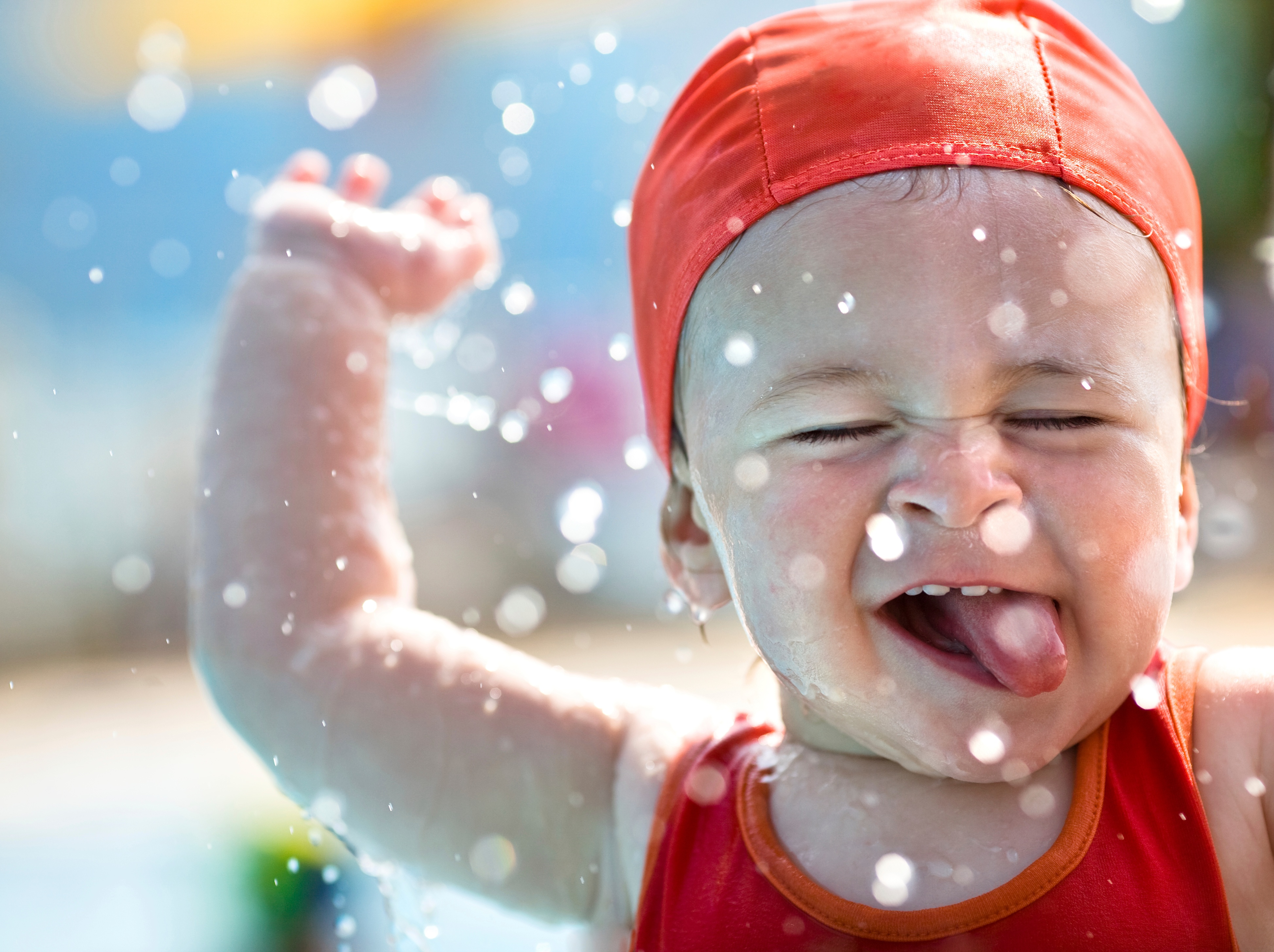 Toddler having fun in the water.