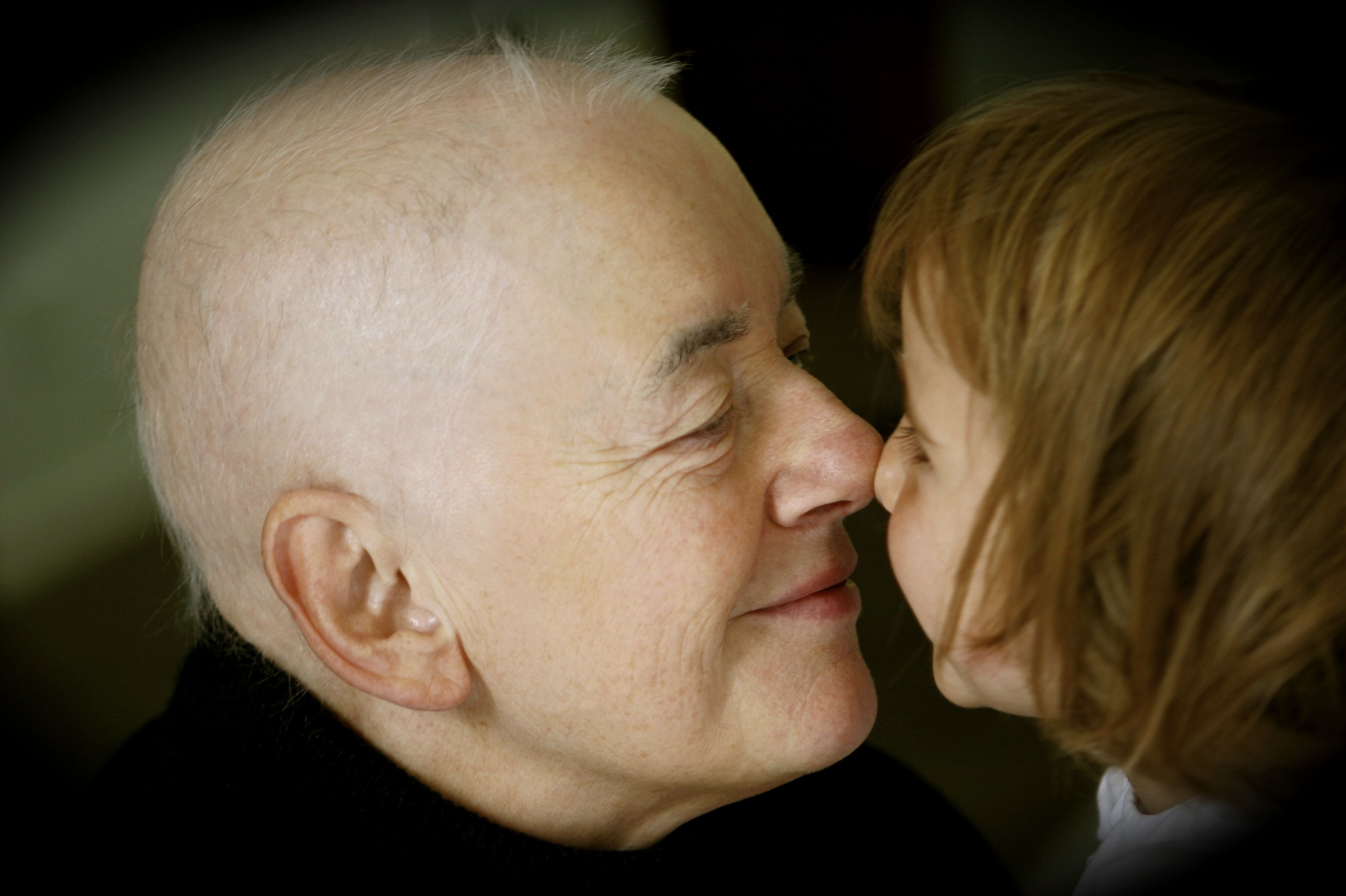 An example of mirroring, a Grandpa and preschool child rubbing noses